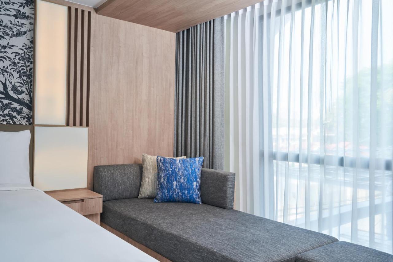 Premier Zimmer mit Kingsize-Bett, Schlafsofa und Stadtblick