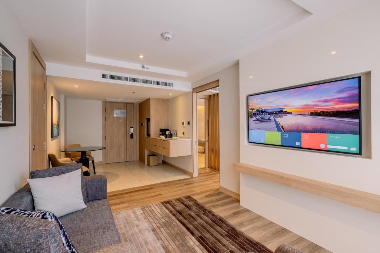 Executive Suite mit Kingsize-Bett und Stadtblick