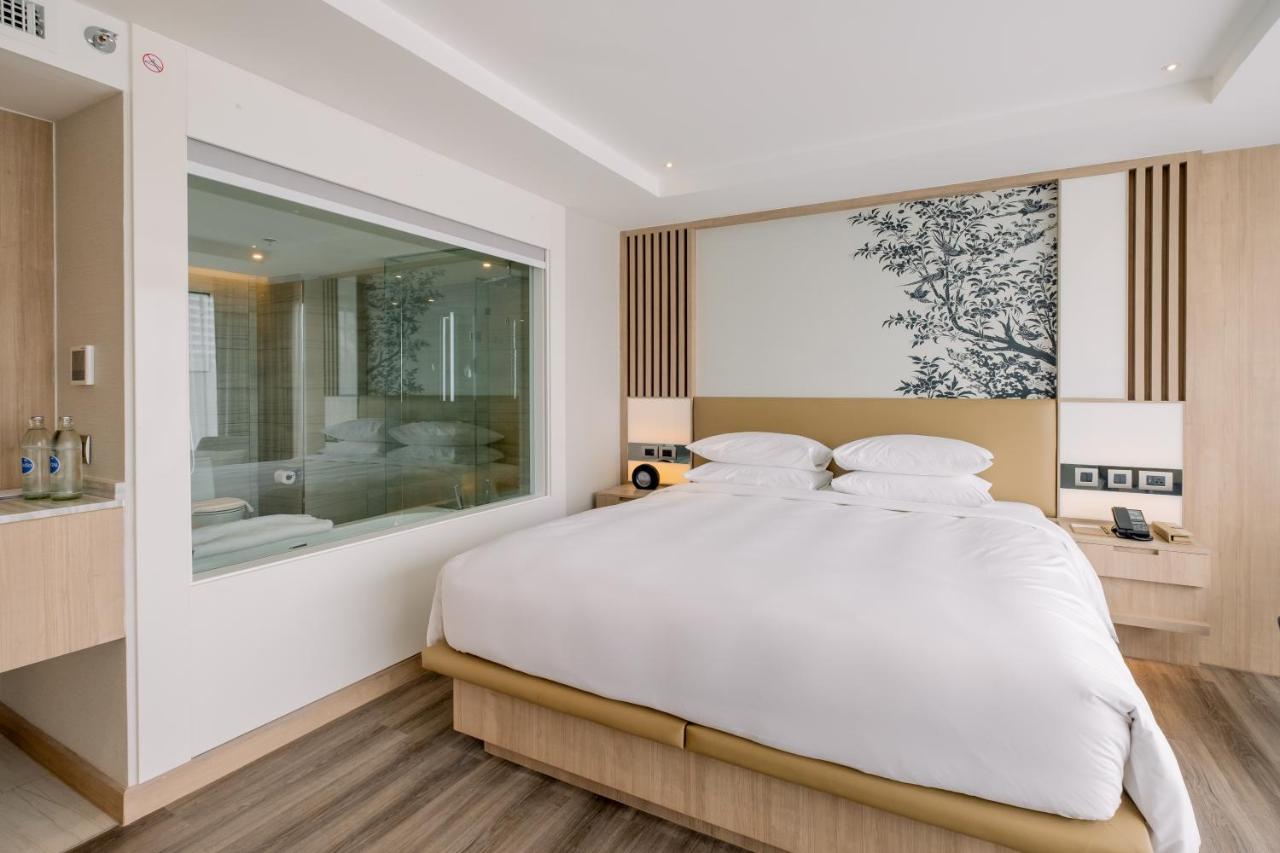 Deluxe Zimmer mit Kingsize-Bett und Stadtblick