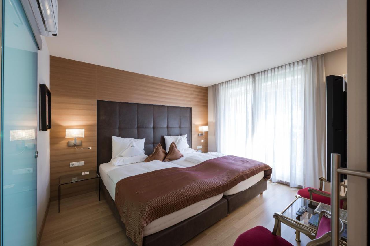Suite mit Kingsize-Bett mit Whirlpool