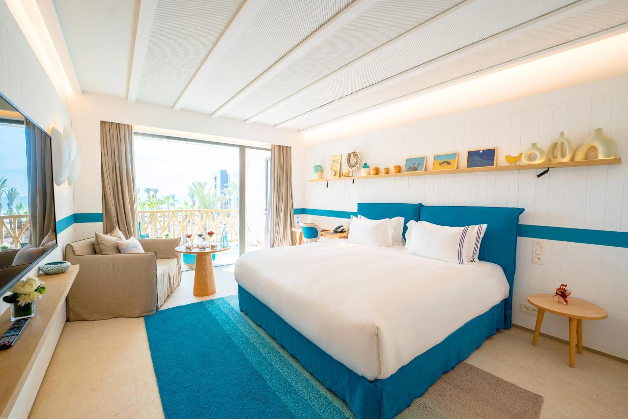 Executive Zimmer mit Kingsize-Bett und Meerblick