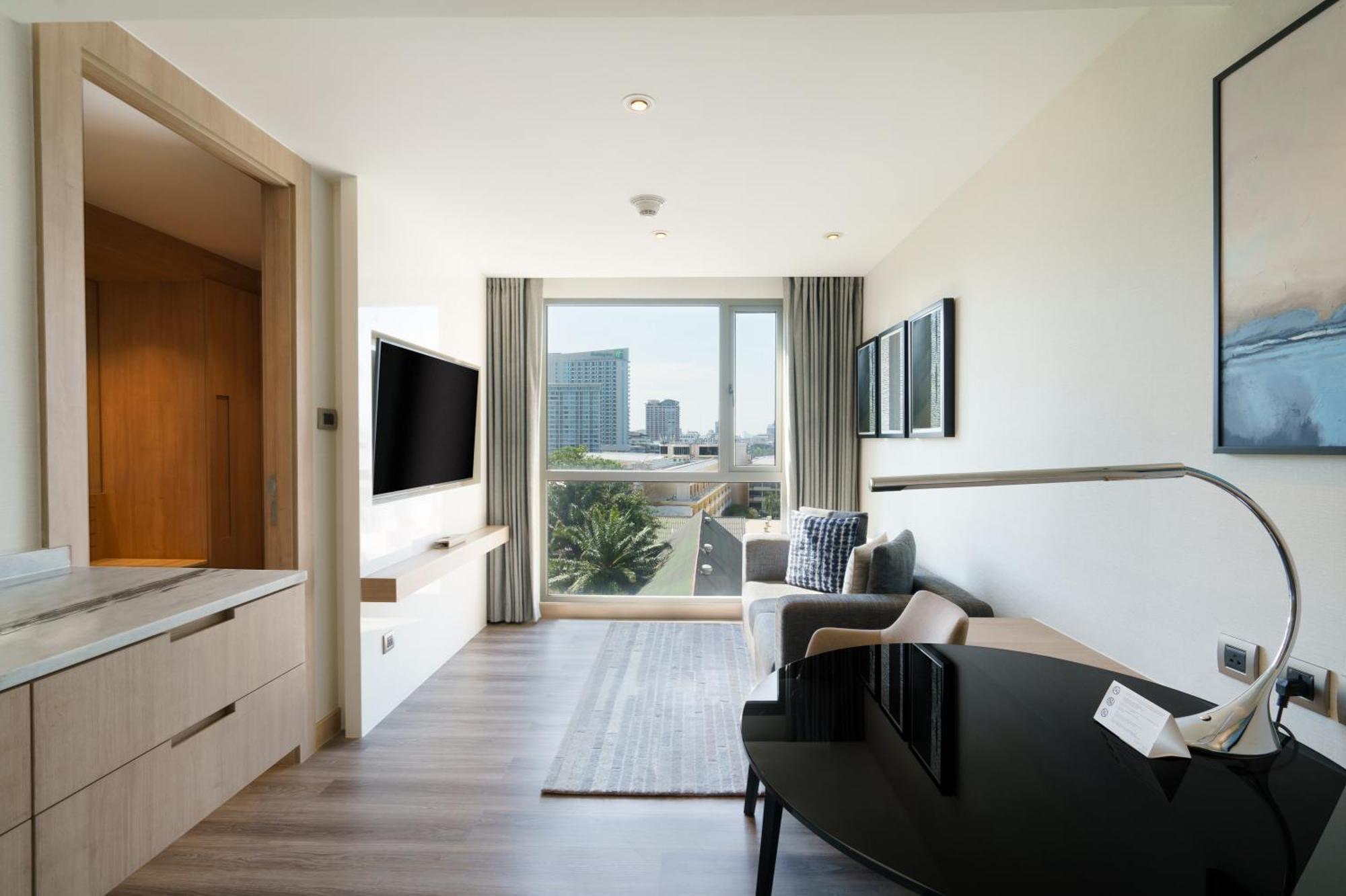 Deluxe Suite mit 1 Schlafzimmer mit Kingsize-Bett und Stadtblick