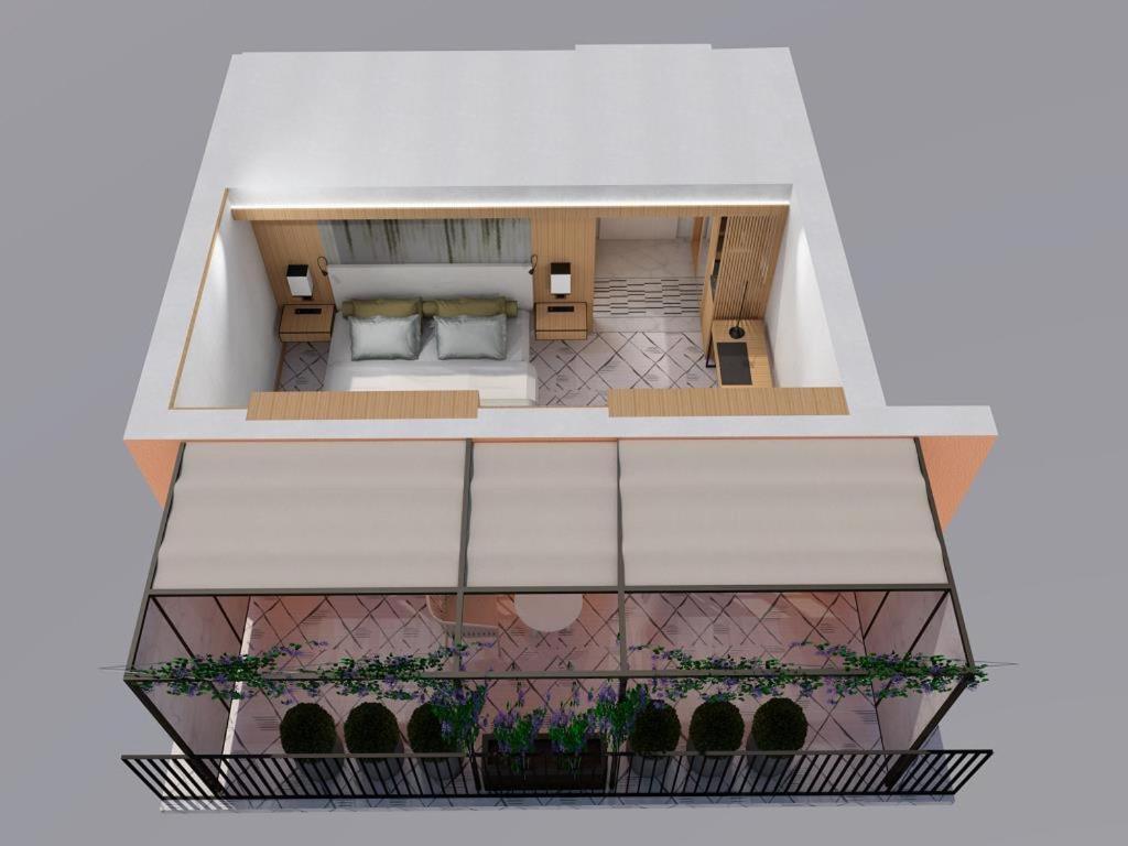 Dachterrassen-Zimmer mit Kingsize-Bett und Patio