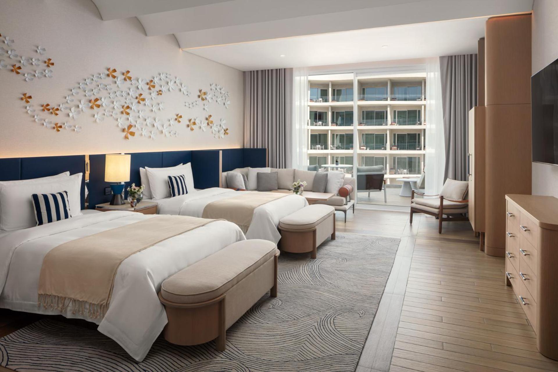 Deluxe Zweibettzimmer mit Poolblick