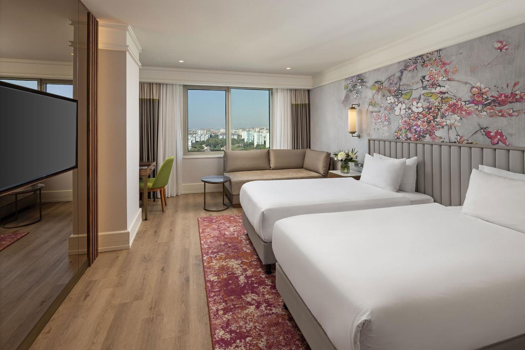 Deluxe Doppel-/Zweibettzimmer mit Stadtblick