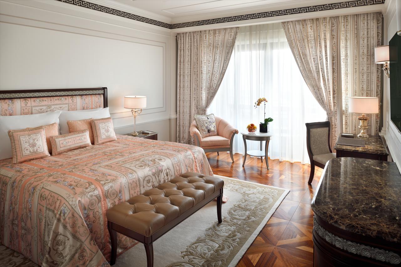 Deluxe Versace Room City View Guaranteed Upgrade to next room type 4pm Late Check-out subj to availability F&B excl Q's Brunch room dining Book one SPA treatment 1 applicable stays until 25 May 2026